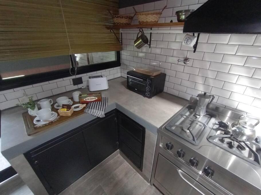 Апартаменты Escala Ezeiza Loft Con Desayuno Луис-Гильон Экстерьер фото